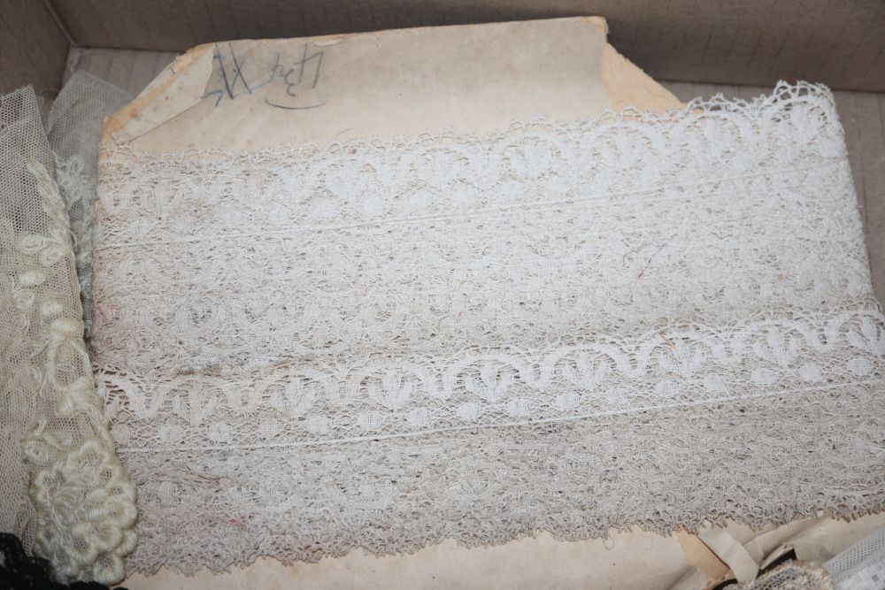 An Edwardian ladies lace blouse, a black bobbin lace shawl, a cream silk machine lace shawl and mixed trimmings